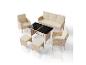 Ensemble de mobilier de jardin en rotin avec canapé trois places, deux fauteuils, deux poufs et table basse en verre.
