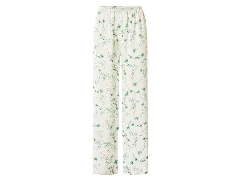 Pantalon de pyjama blanc à motif floral vert.