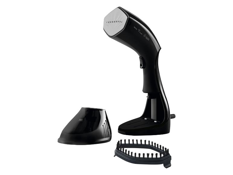 Fer à repasser vapeur à main noir avec accessoires pour vêtements.