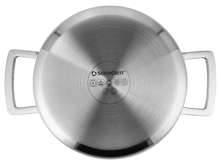 Fond d'une casserole en acier inoxydable avec symboles de compatibilité.