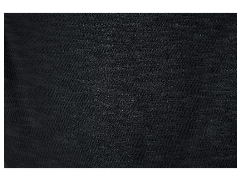 Texture noire d'un vêtement en tissu.
