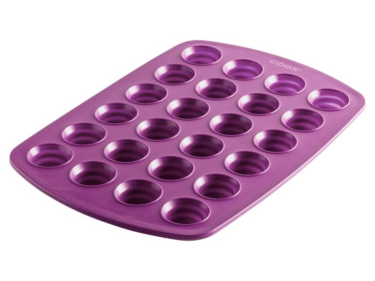 Moule à muffins Coox de couleur mauve.
