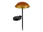 Une lampe de jardin solaire en forme de champignon.