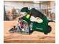 Une scie circulaire Parkside PTS 710 B2 verte sur une table en bois.