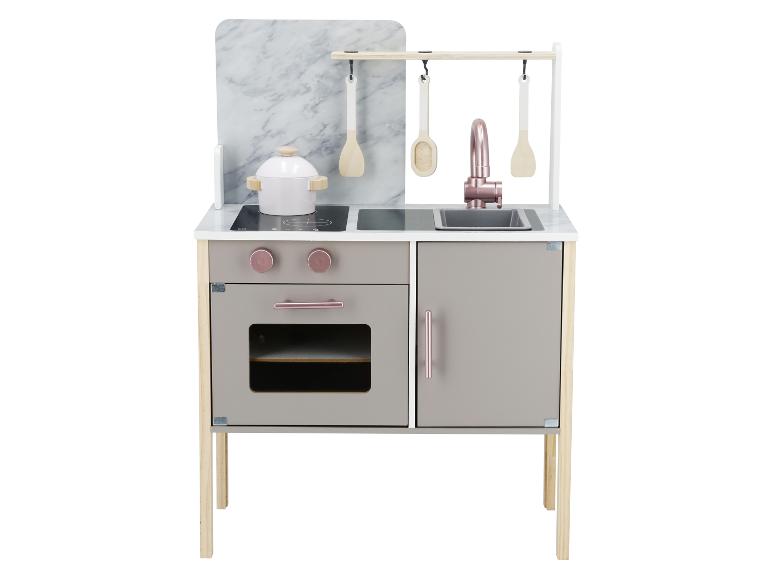 Cuisine de jeu en bois avec évier, robinet, four et accessoires de cuisine.