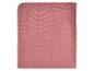 Couverture matelassée rose avec motif géométrique