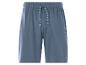 Short de pyjama bleu avec cordon de serrage, texte « CR7 » et « NIGHTWEAR » sur la jambe.