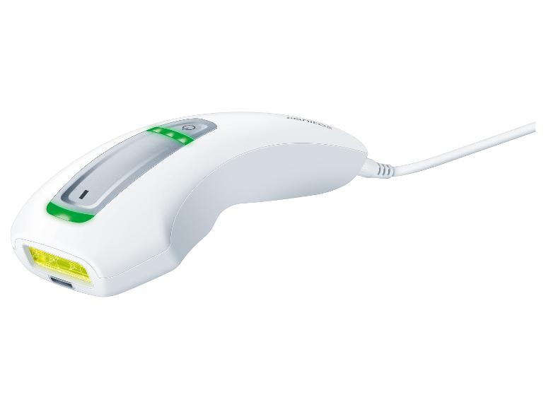 Épilateur IPL blanc avec indicateurs verts et lumière jaune.