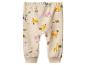 Pantalon bébé beige clair avec motif safari d'animaux et de plantes