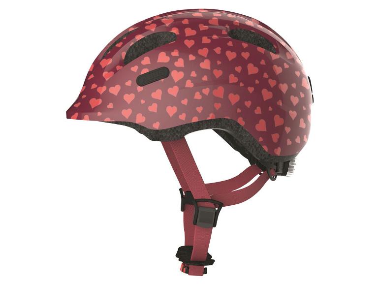 Casque de vélo ABUS pour enfant avec motif cœurs.
