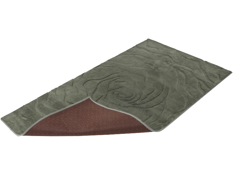 Tapis de bain gris avec motif ondulé et envers antidérapant.