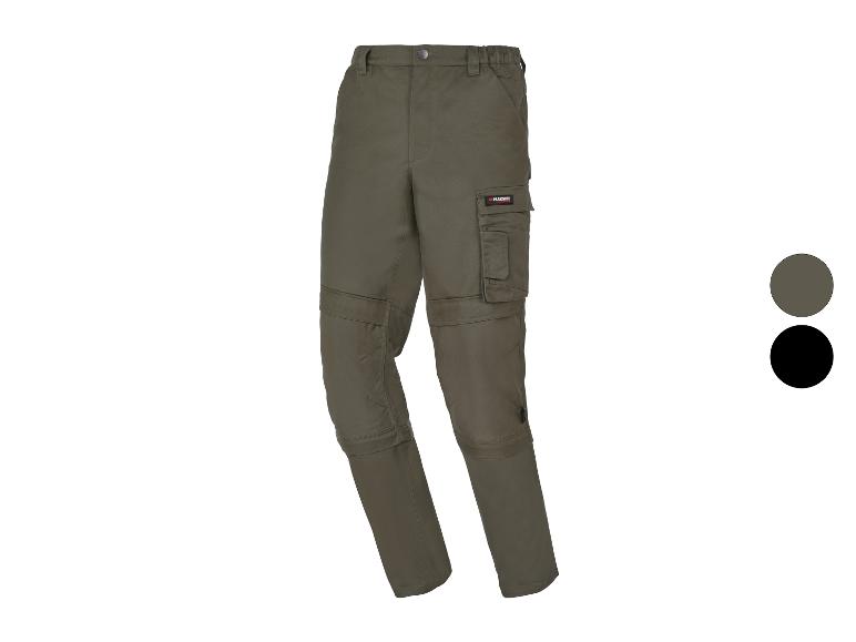 Pantalon de travail vert avec jambes détachables et poches, également disponible en noir.