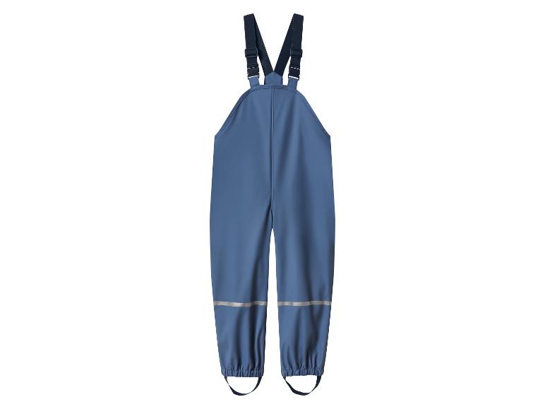 Salopette imperméable bleue avec détails réfléchissants.