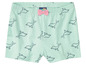 Shorts pour bébé fille avec un motif de dauphins de la marque Juniblue.