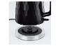 Une bouilloire noire avec un motif en nid d'abeille sur une base argentée de Russell Hobbs.
