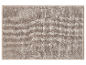 Tapis de bain beige texturé doux.