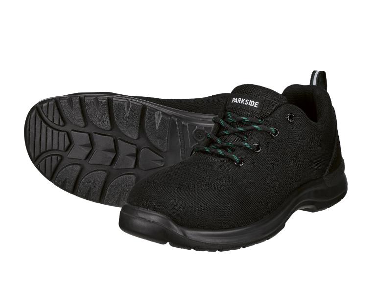 Chaussures de travail noires avec lacets verts et semelle robuste