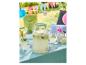 Distributeur de boissons SILVERCREST® avec de la limonade sur une table de jardin décorée