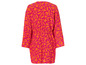 Une robe rose à manches longues avec un imprimé abstrait orange.