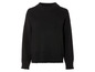 Un pull noir à manches longues en tricot.