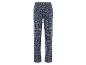 Pantalon bleu foncé à imprimé floral blanc.