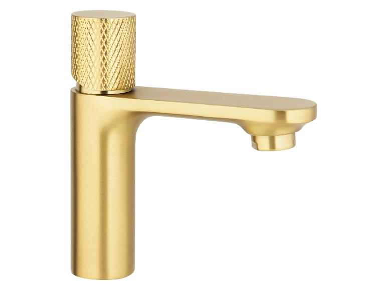 Robinet doré satiné avec bouton sculpté.