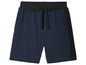 Pantalon de survêtement bleu marine avec des accents noirs