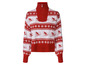 Un pull rouge et blanc avec un motif de ski.