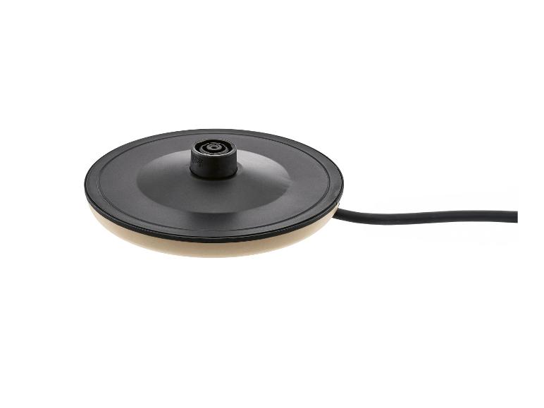 Base de bouilloire électrique avec cordon, beige et noir.