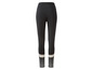 Leggings noires avec des rayures blanches en bas.