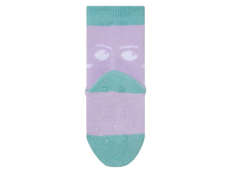 Des chaussettes lilas et turquoise avec des points antidérapants