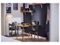 Lampadaire LED moderne LIVARNO® éclairant un coin repas.