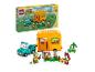 Ensemble LEGO Animal Crossing Leif's Caravan & Garden Shop avec voiture et figurines.