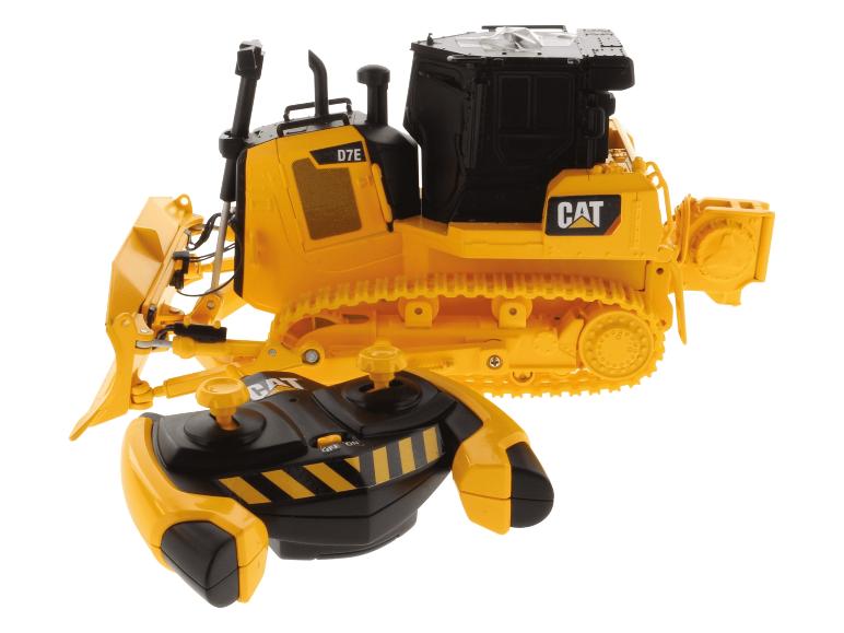 Bulldozer jouet Caterpillar D7E jaune avec télécommande.