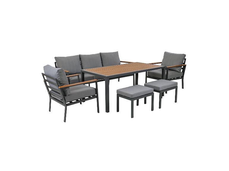 Ensemble de mobilier de jardin avec coussins gris foncé, table en bois et deux poufs.
