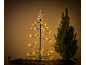 Sapin de Noël lumineux en spirale avec une étoile et un petit sapin naturel.