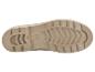 Semelle de botte beige avec un motif de traction robuste.