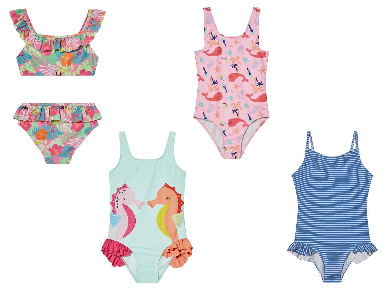 Maillots de bain enfant : modèles tropicaux, baleines, hippocampes et rayures.
