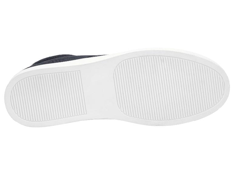 Semelle de chaussure de sport blanche avec motif rainuré