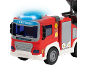 Camion de pompiers jouet rouge avec lumières bleues clignotantes et texte 'FIRETUCK'.