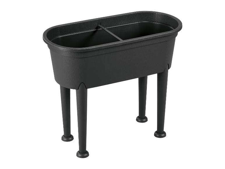 Jardinière surélevée ovale noire à quatre pieds