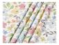 Tissu blanc avec un motif floral aquarelle dans des tons pastel de rose, bleu, jaune et vert.