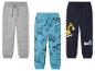 Trois pantalons de jogging pour garçons avec des motifs d'excavateurs et d'autres véhicules.