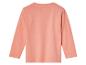 Un t-shirt à manches longues rose pour enfant.