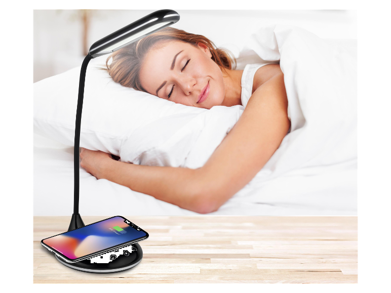Lampe de bureau moderne avec chargeur sans fil pour téléphone.