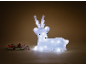 Figurine de renne lumineuse couchée avec décorations de Noël.
