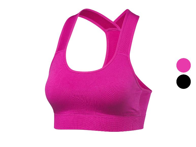 Soutien-gorge de sport rose avec bretelles croisées, avec deux cercles de couleur à côté.