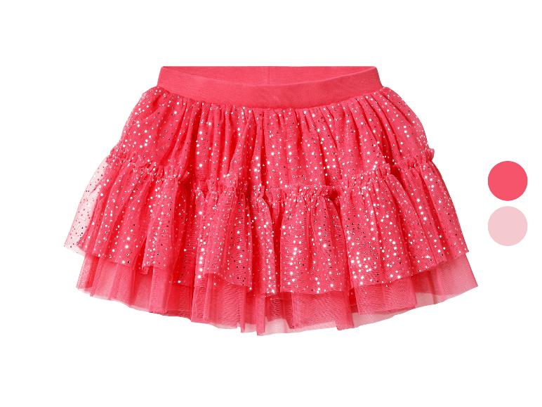 Jupe tutu rose à paillettes avec deux échantillons de couleur.