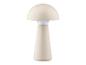 Une lampe de table beige en forme de champignon.