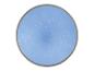 Un plafonnier rond bleu avec des points blancs.